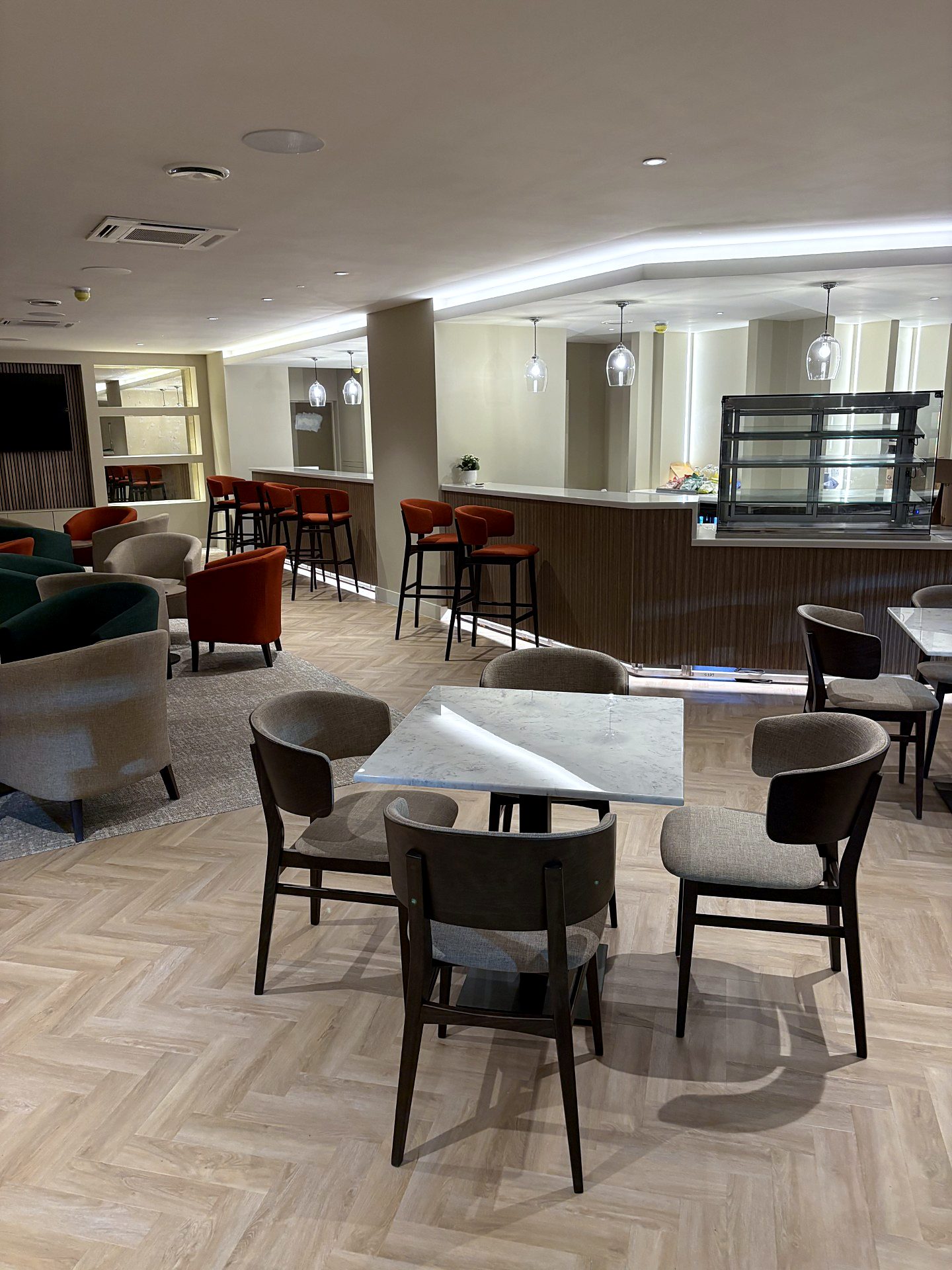 Sophia side chairs at a marble-effect dining table
